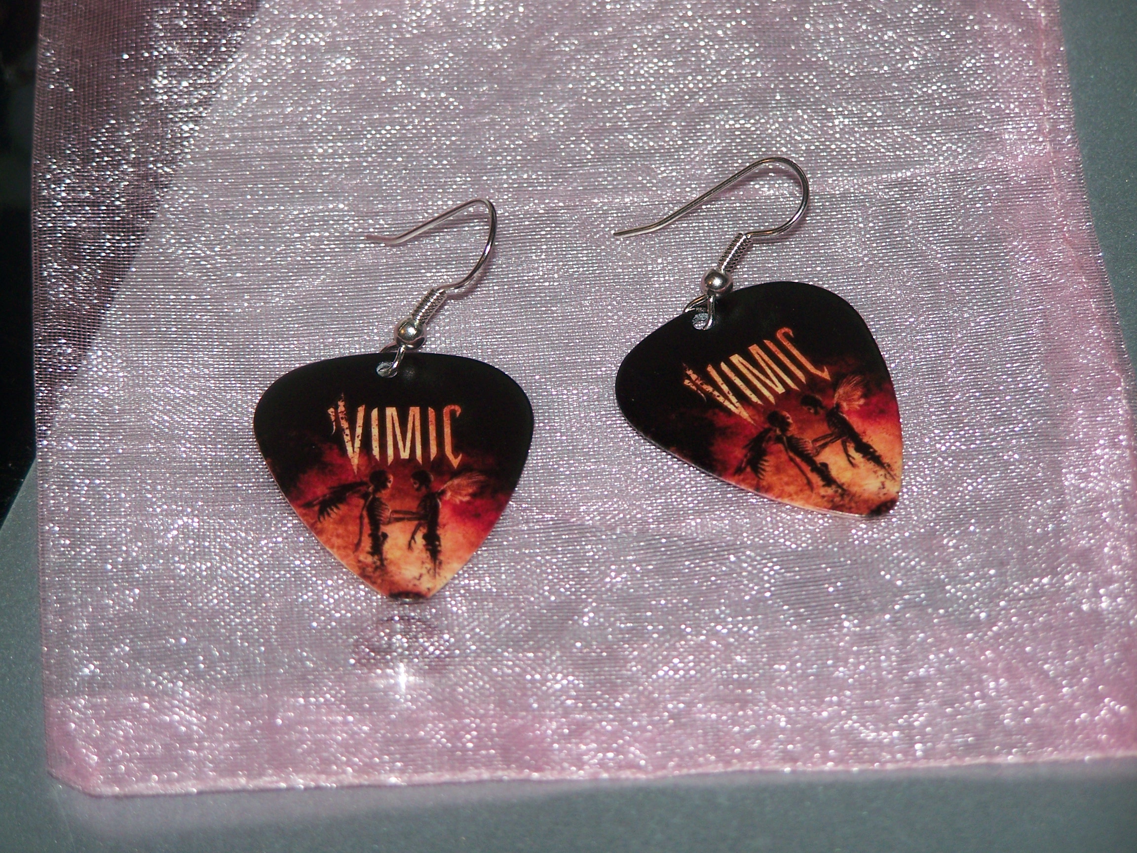 guitar pick earring made with sublimation printing