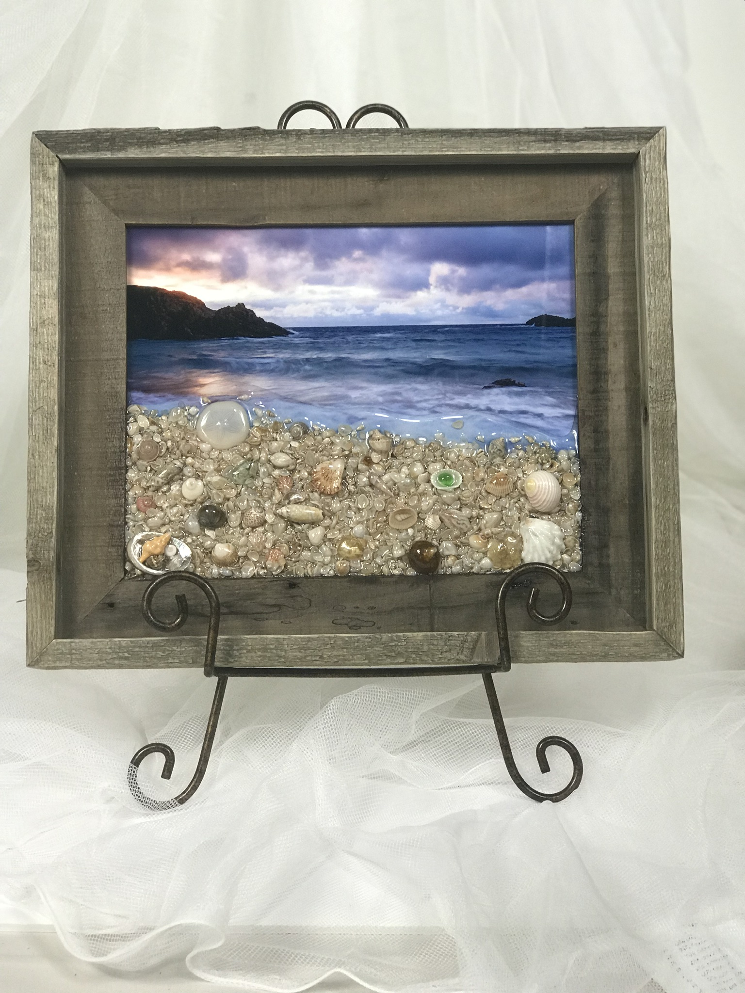 This is a piece I created using a 8x10 Chromaluxe white coated metal then added sea shells I co
