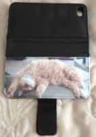 new iphone case with a cat playing possum!