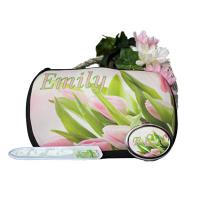 This Tulip Cosmetic Bundle includes a cosmetic bag, crystal nail file and oval silvertone compa