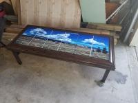 Custom Coffee table. Imaged to 12 8x8 IronClad Gloss Tiles. The center 16x16 section is removab