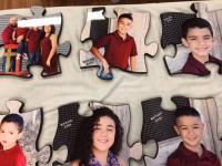 Family photos on puzzle pieces