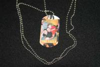 A dog tag with a family picture. Sorry 'bout the quality. It looks MUCH better than what the ph