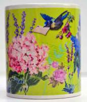 Using my graphic arts skills I've designed this floral collage mug.

I used Photoshop, and am