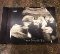 I made this baby book for an expectant mother to add photos too. The cover is her ultrasound. S
