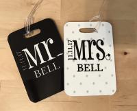 Custom wedding luggage tags for Mr. and Mrs. ring and mustache.
