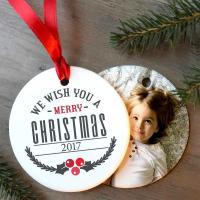 Easily add a personalized photo to the â€œWe Wish You A Merry Christmasâ€, Christmas ornament.