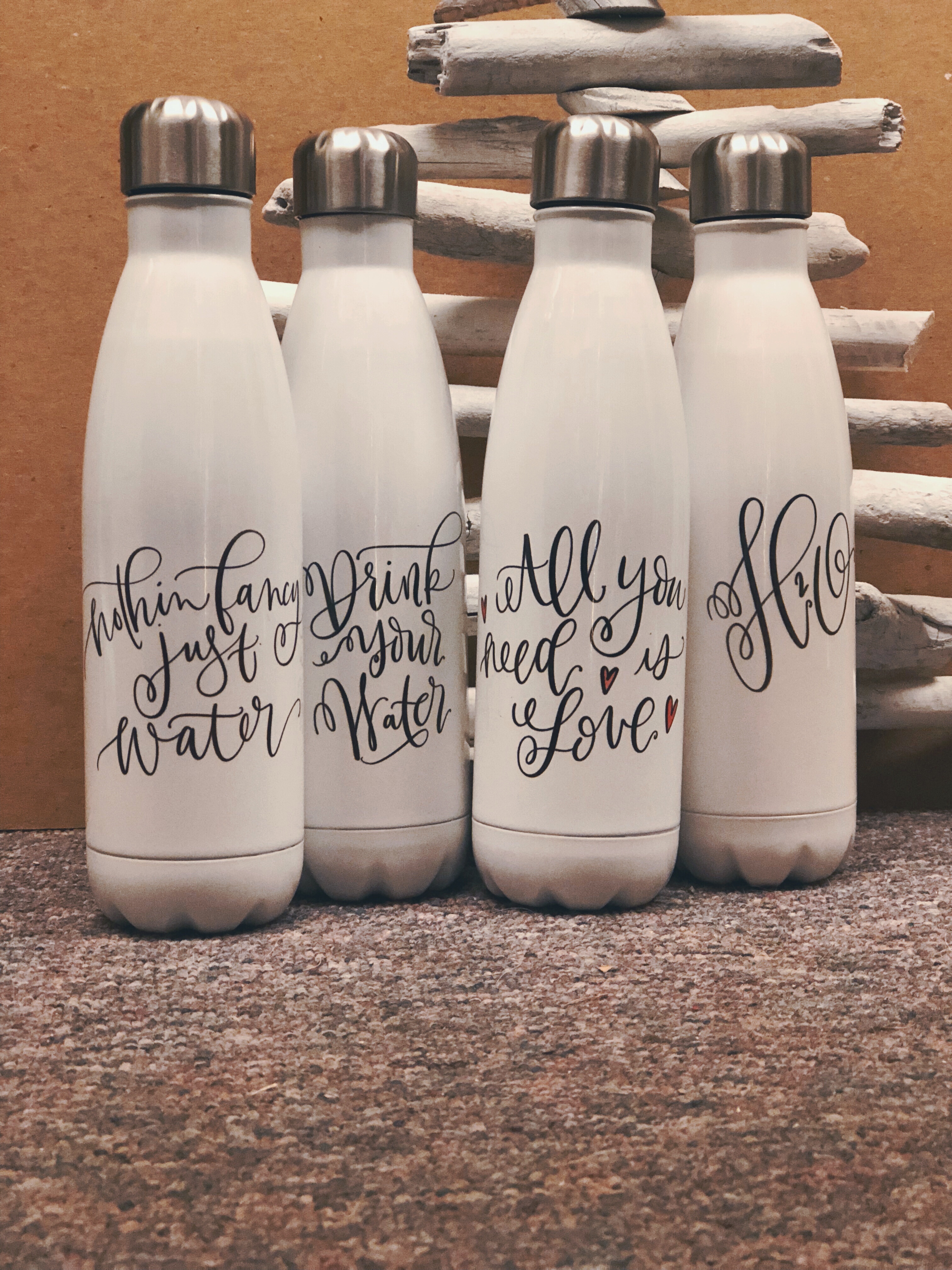 Water Bottles with Custom Calligraphy made with sublimation printing