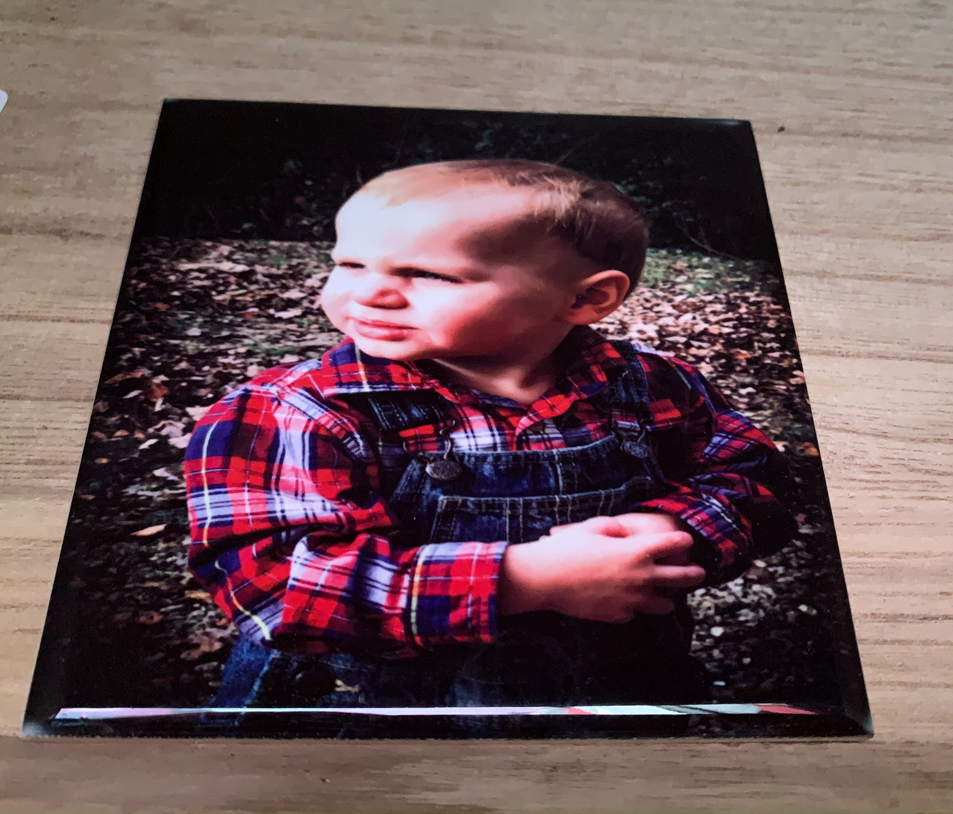 My grandson Kaden in my front yard and captured in this stunning tile! The reds came out perfec