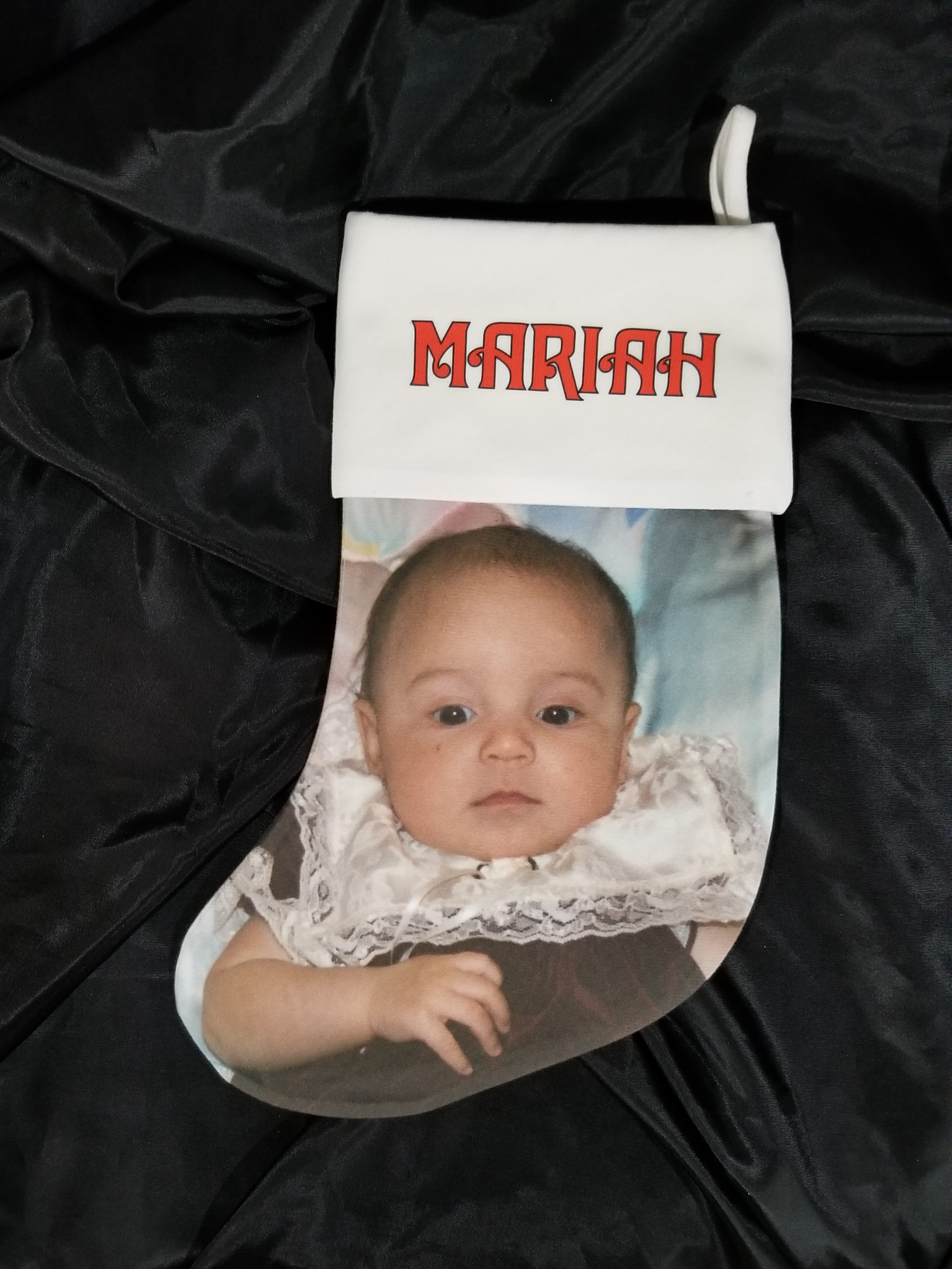 Put my daughter's first Christmas photo on a stocking for a sample. Love how it turned out.