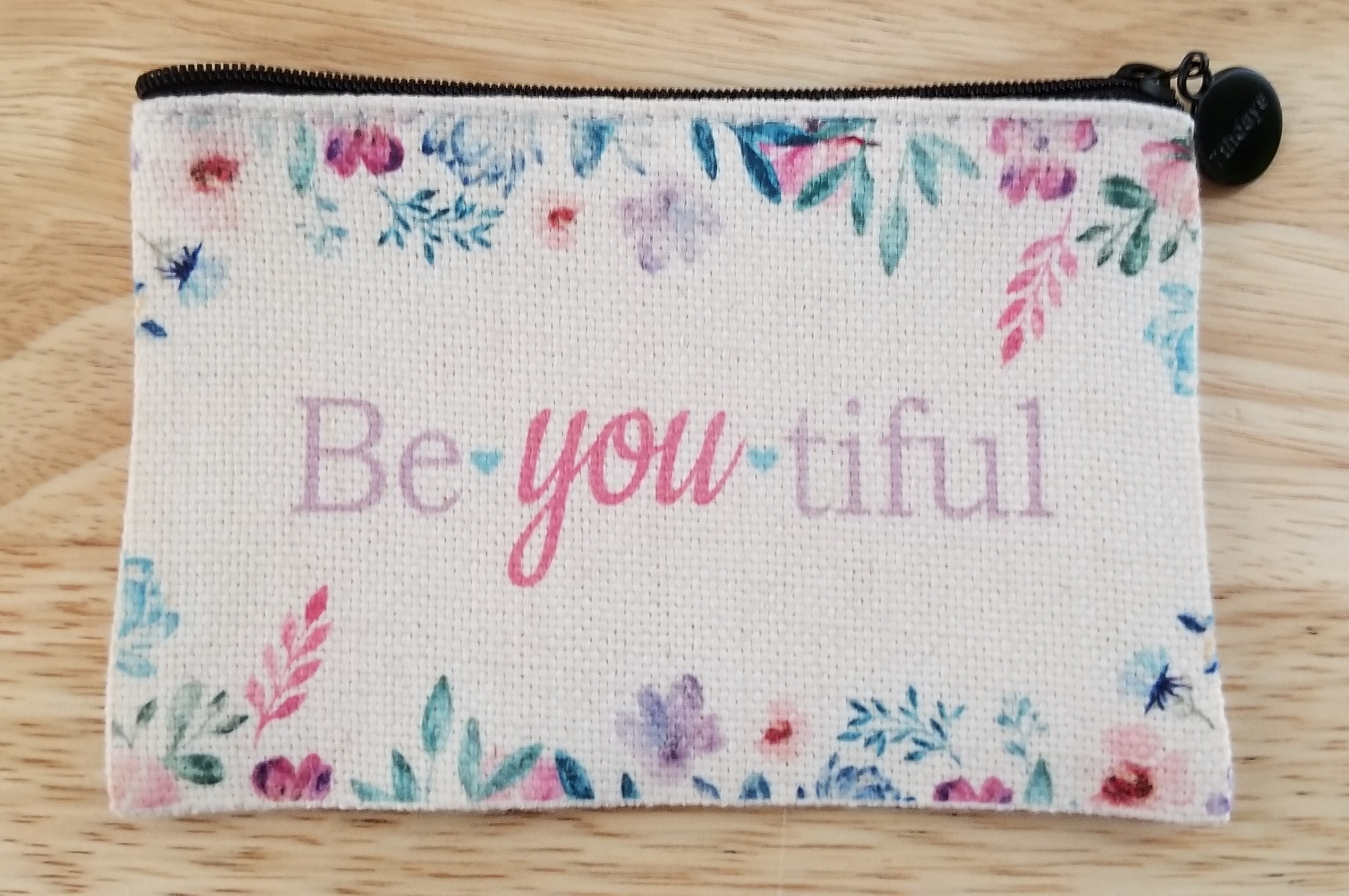 Small linen bag with watercolor Be You tiful design.
