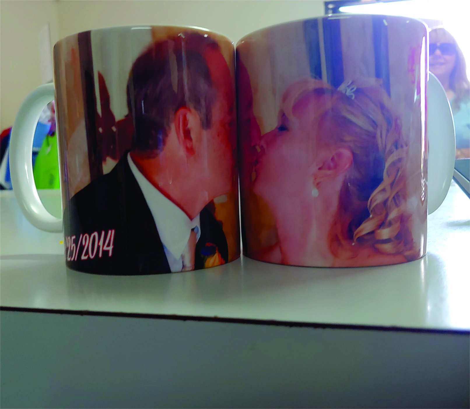 Printed 2 mugs as if they are Kissing Each Other.