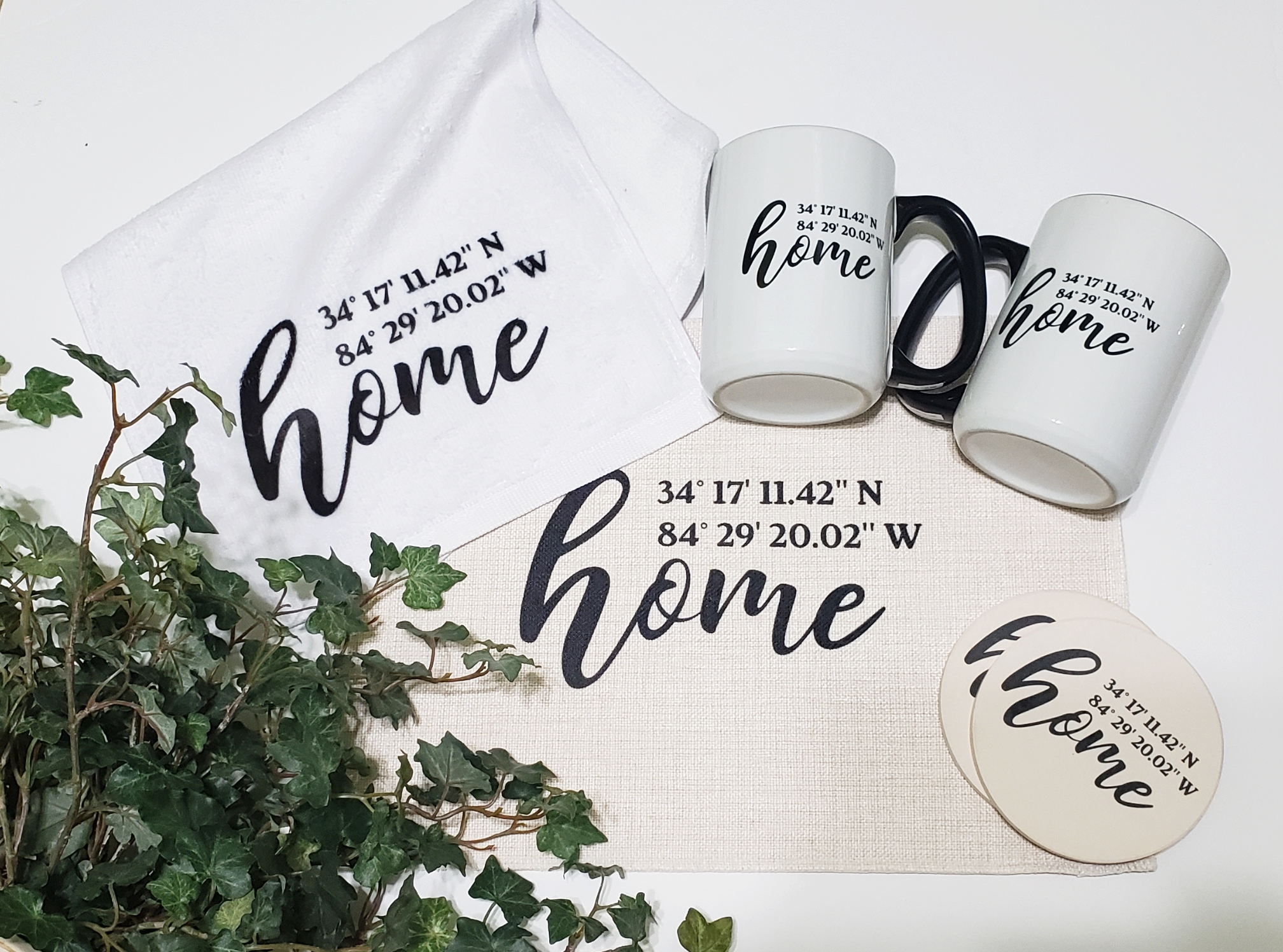 A realtor gift for her clients including a mug, linen placemat and towel.