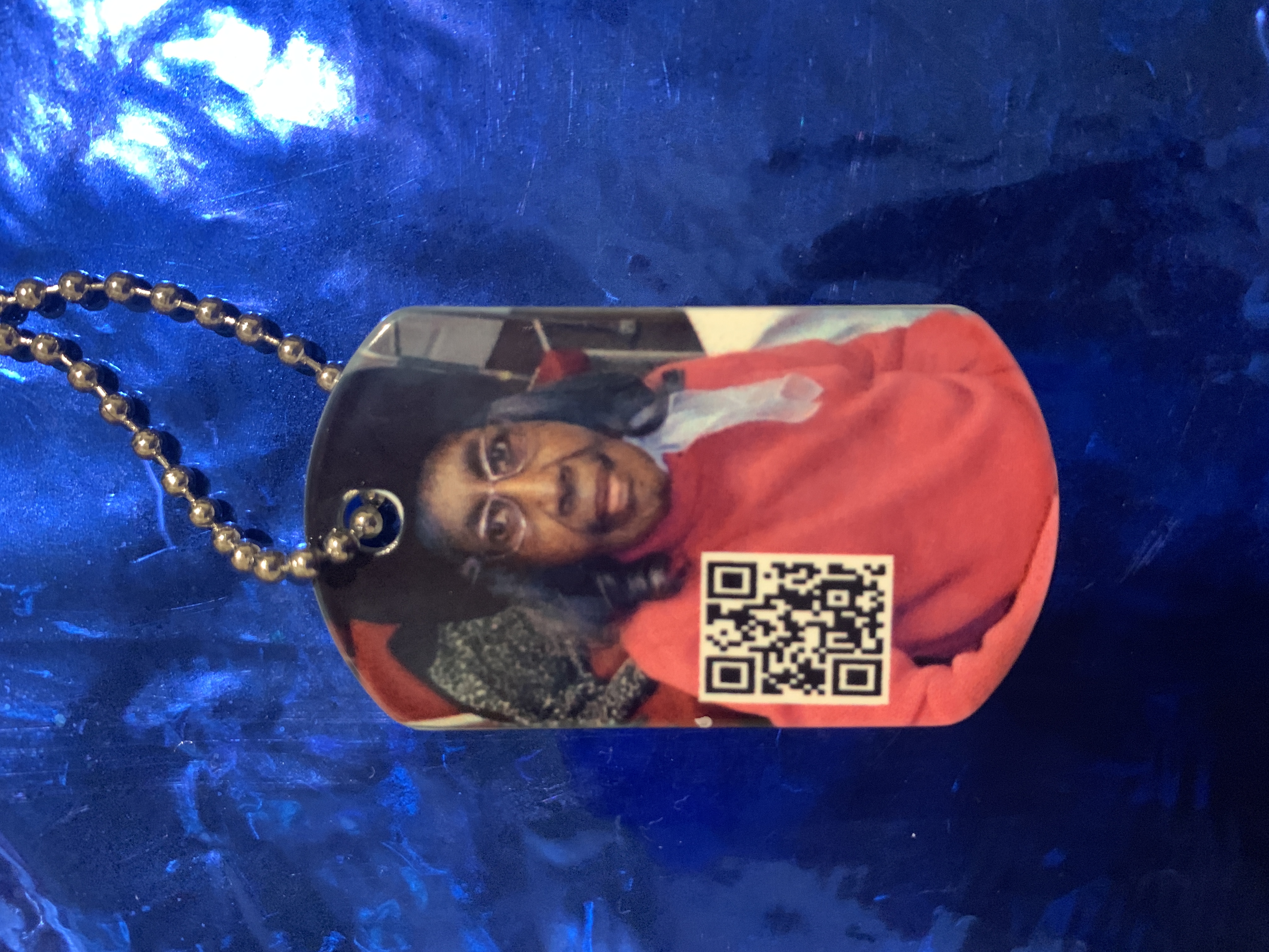 This 2 sided dog tag has a scannable QRcode attached to it that will allow people to hear memor