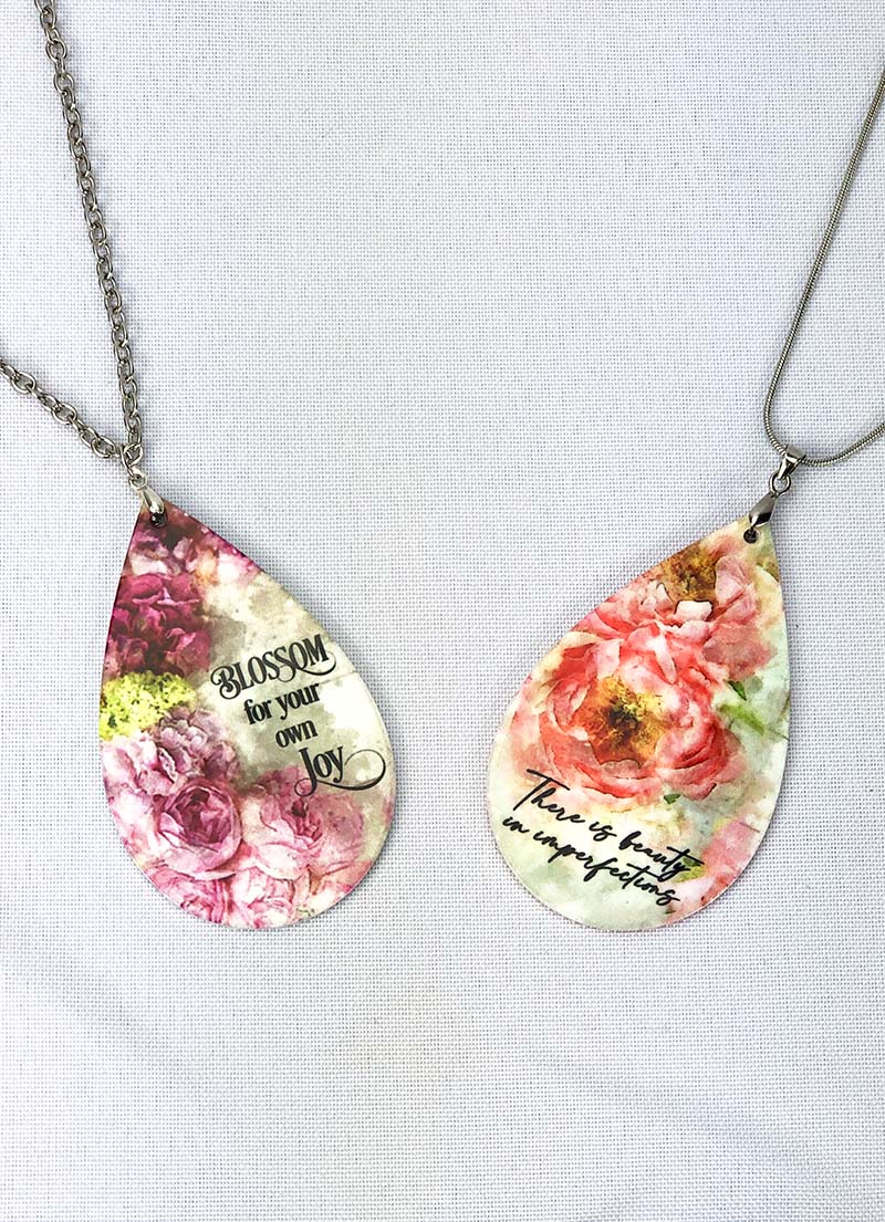 Double-sided Teardrop Pendants featuring floral watercolor images and inspirational quotes. Per