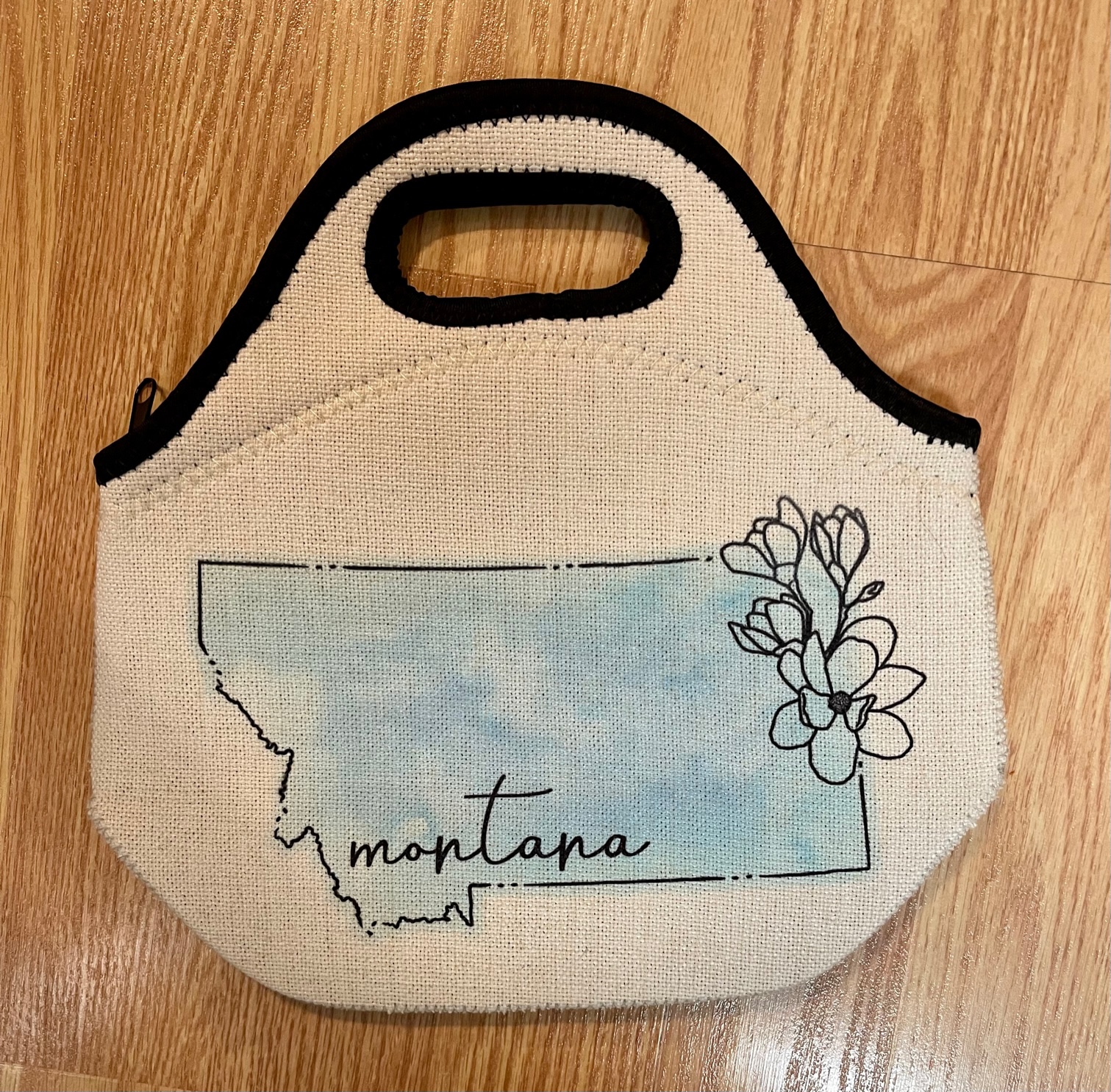 SubliLinen Lunch Bag with Floral Watercolor Montana design on both sides of the lunch bag.  