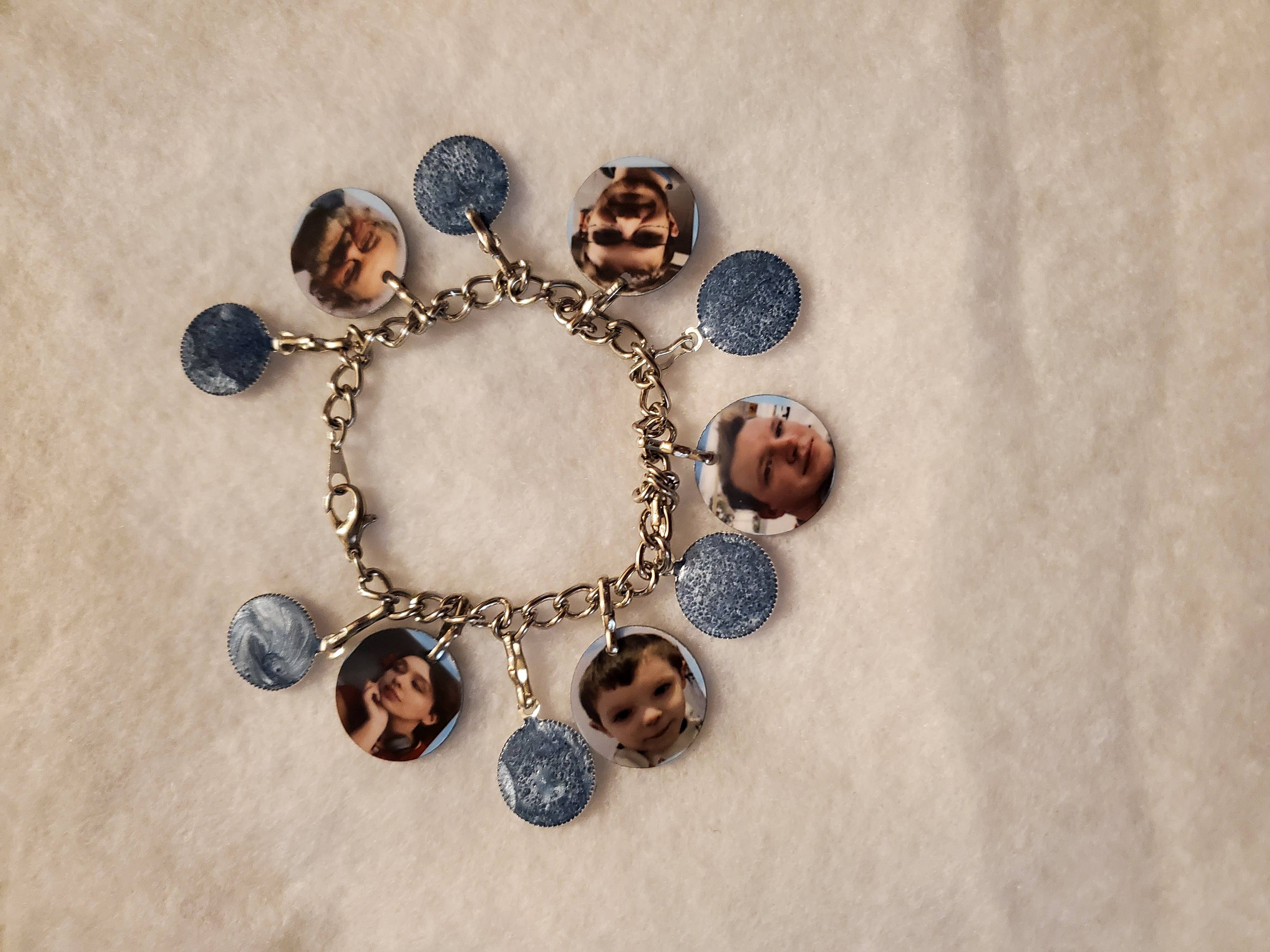 Family photos of husband, children and grandson sublimated on individual charms then a medium b