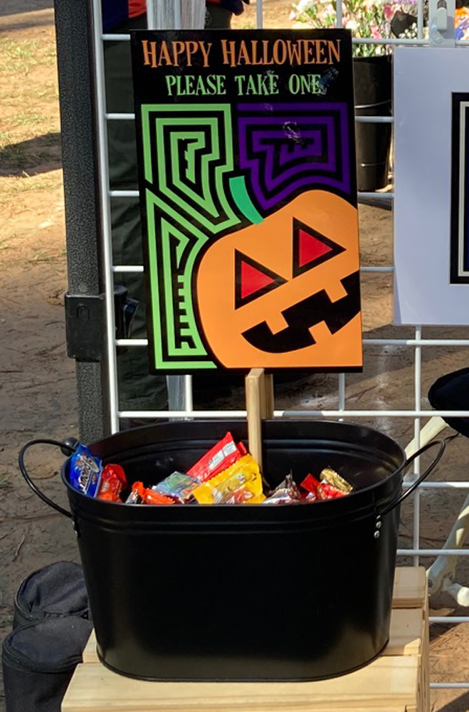 Sign I made for a Halloween market using a serving tray insert. My husband made the holder with