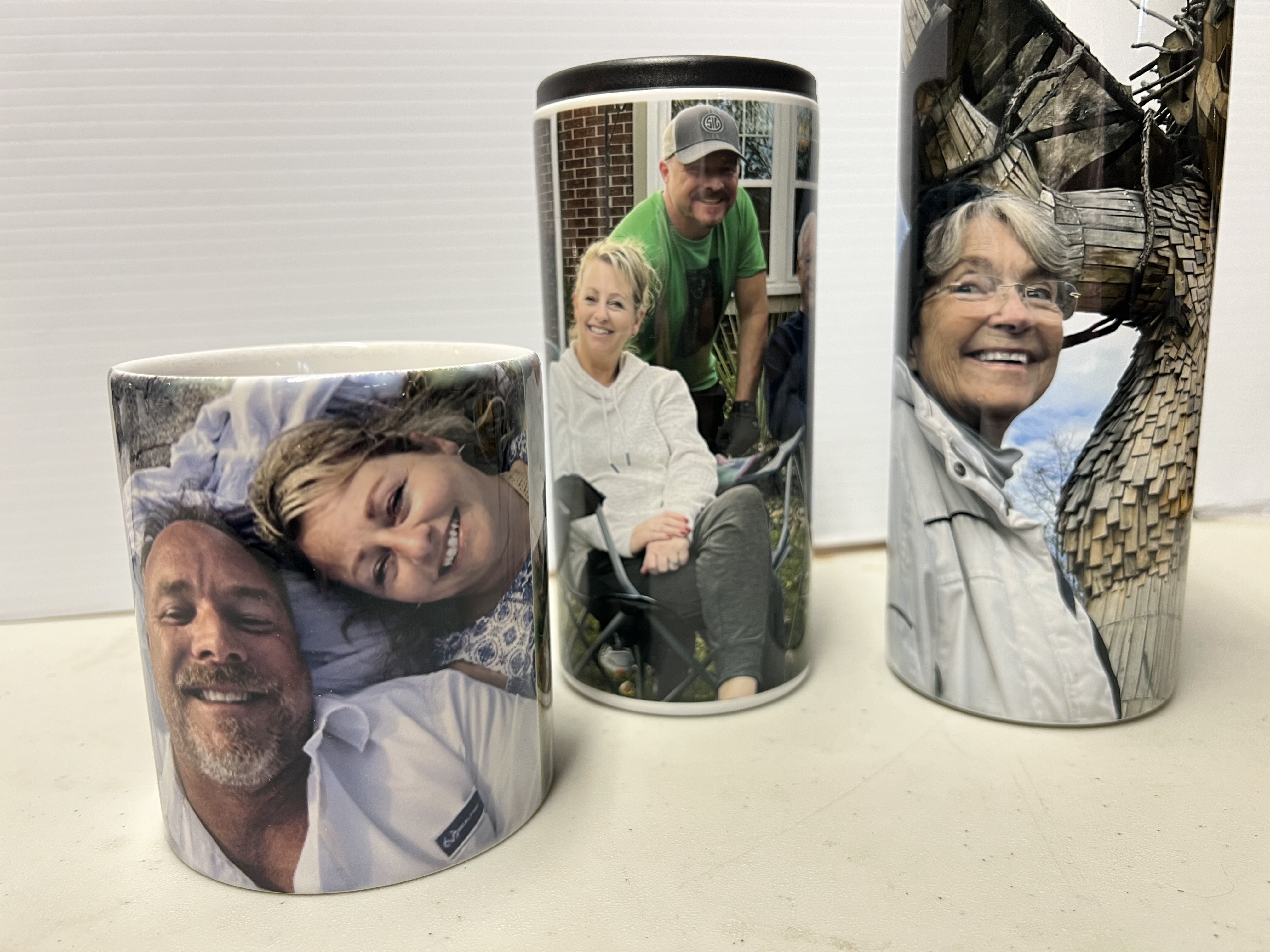 Family gifts of flask and mug with happy memories imprinted.