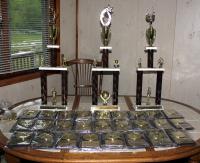 Trophies and plaques with sublimated plaques for the sports awards banquet.