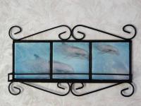 This is a wrought Iron frame/shelf. It was made for a couple's camper with a beach theme.
I us
