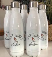 This is a set of water bottles I made for my customers new studio.