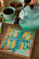Our Patent Pending Cork Tray holds 4 coasters together to be used as a trivet.