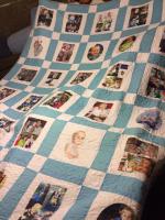 The photos were printed on poly fabric and then pieced together to make a quilt hilighting this
