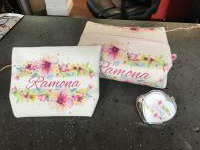 2 cosmetics bags and mirror set. Bags are lined to be washable