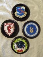 These are coasters I made for my Dad.  They are the insignias of different groups he was in whi