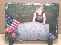 This is my 2nd cousin at the gravesite of his uncle Nick who passed away 12 Years ago today.