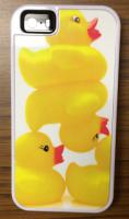 Rubber ducks on a white plate. The Brookley cases are really great products.