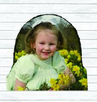 Photo of my granddaughter in a field of daffodils on slate