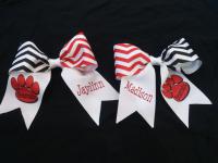 Custom Hair bows with names and school logo.