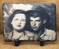 This is an old engagement photo (80+ years old) that was not in very good condition, but looks 