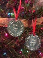 Round chalkboard board design ornaments with chalk look text.